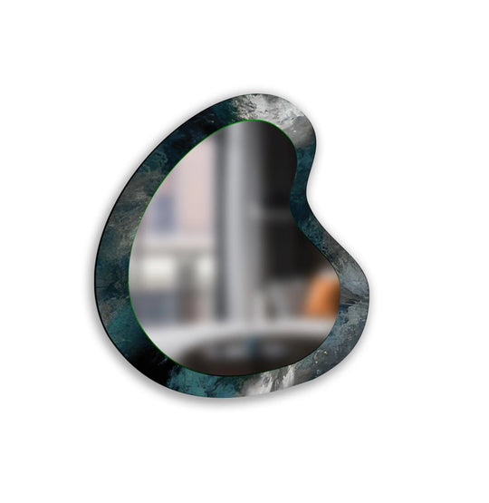 Asymmetric mirror with a decorative green and dark blue abstract patterned frame a modern wall accent and an abstract design