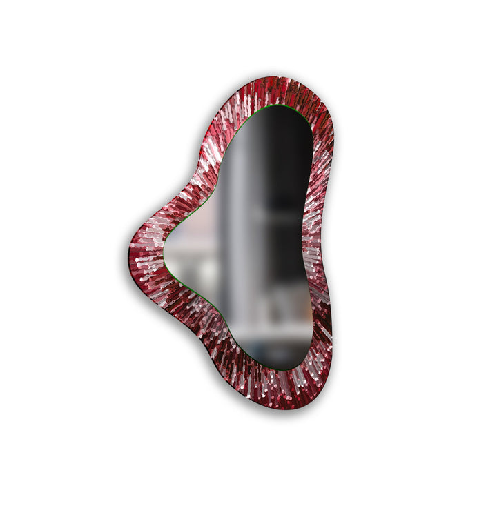 Decorative wall mirror blending artistic patterns with modern functionality for a unique look
