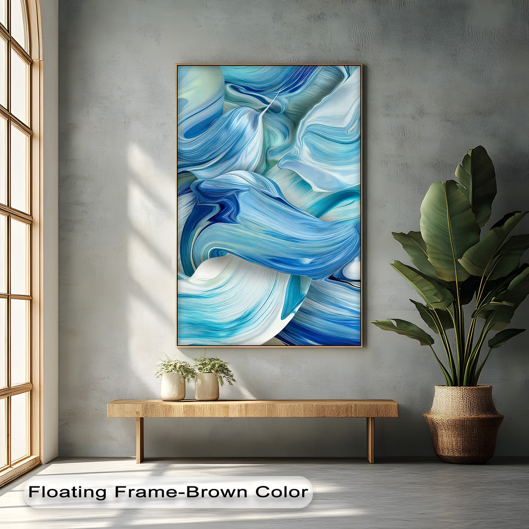 The negative space around the stunning blue flow abstract ocean wave framed canvas reveals a sunlit, textured gray wall and a serene wooden bench.