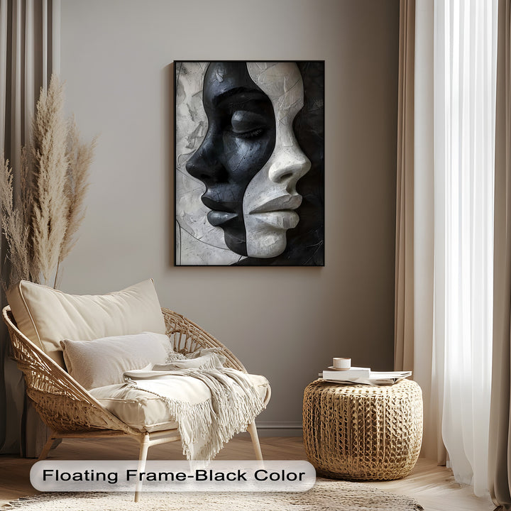 The tranquil and contemporary mood of the room is enhanced by the abstract black and white contrasting faces canvas art.