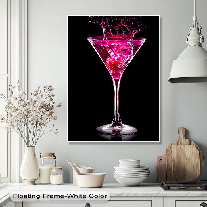 The striking black negative space highlights a vibrant pink martini with a dramatic splash, making it a captivating piece for canvas pictures.