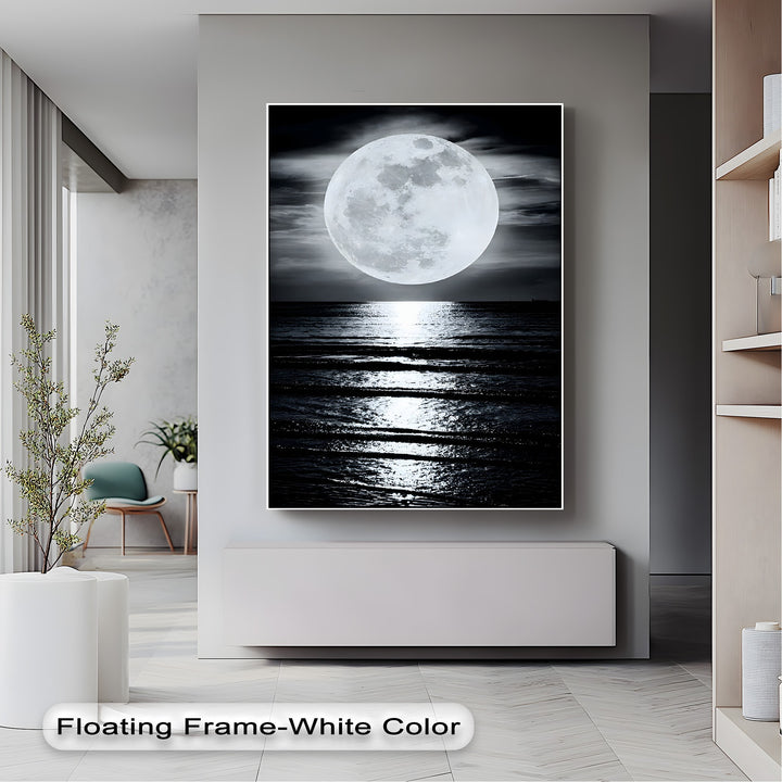 Featuring stark color contrast, this canvas painting showcases a luminous full moon brightly reflecting on the dark, rippling ocean.