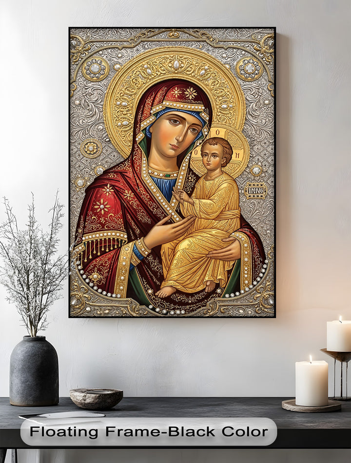 The black floating frame elegantly borders the detailed gold and silver Christian icon of the Virgin Mary and Child, one of the best canvas prints.