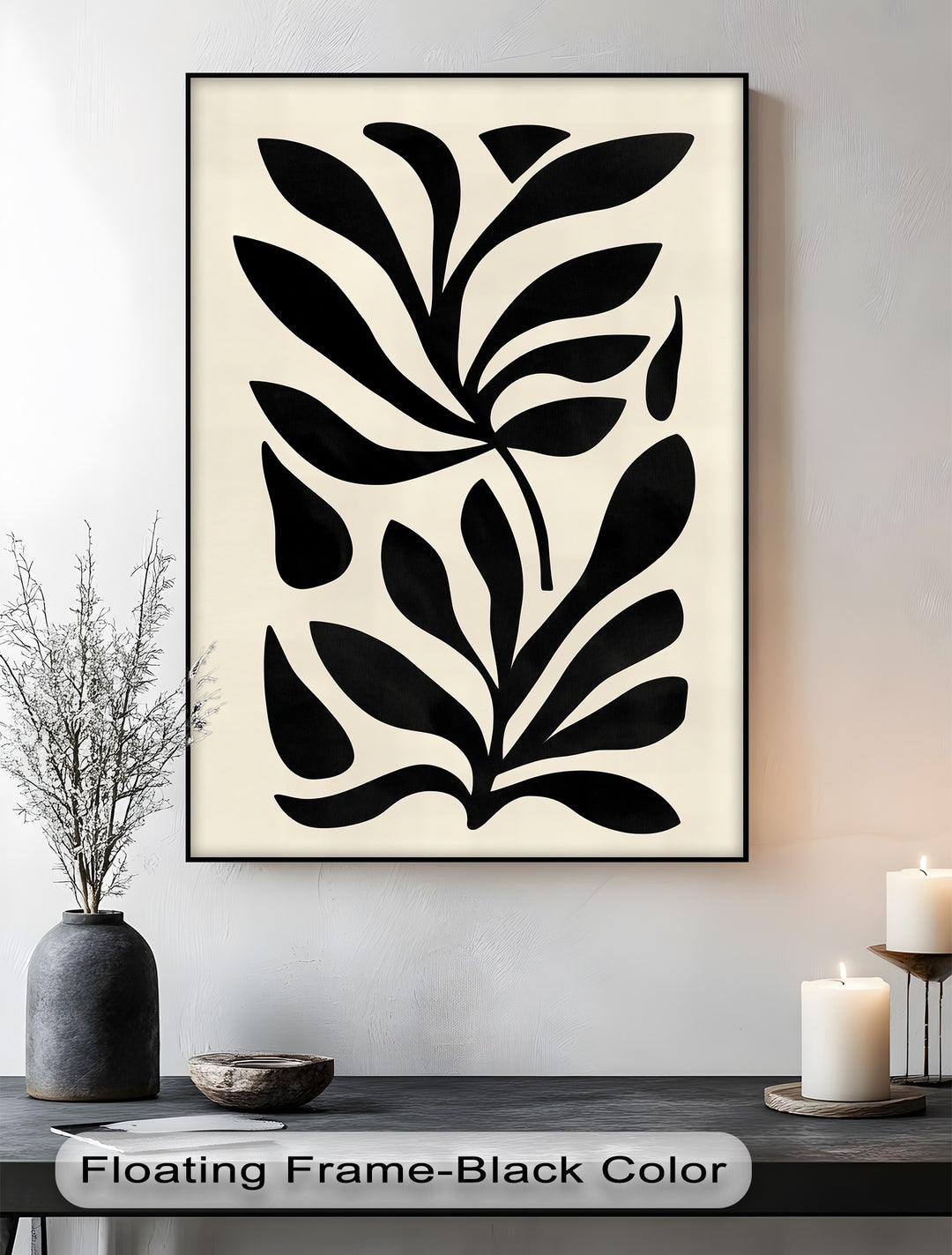 Subtle surface texture highlights the minimalist black botanical canvas print's modern abstract leaf wall art, adding depth to the canvas wall decor.