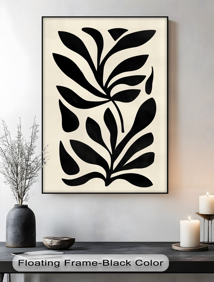 Subtle surface texture highlights the minimalist black botanical canvas print's modern abstract leaf wall art, adding depth to the canvas wall decor.