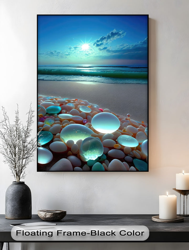 A tall, rectangular canvas pictures print features a glowing pebble beach at sunset, with shimmering ocean waves under a bright sky.