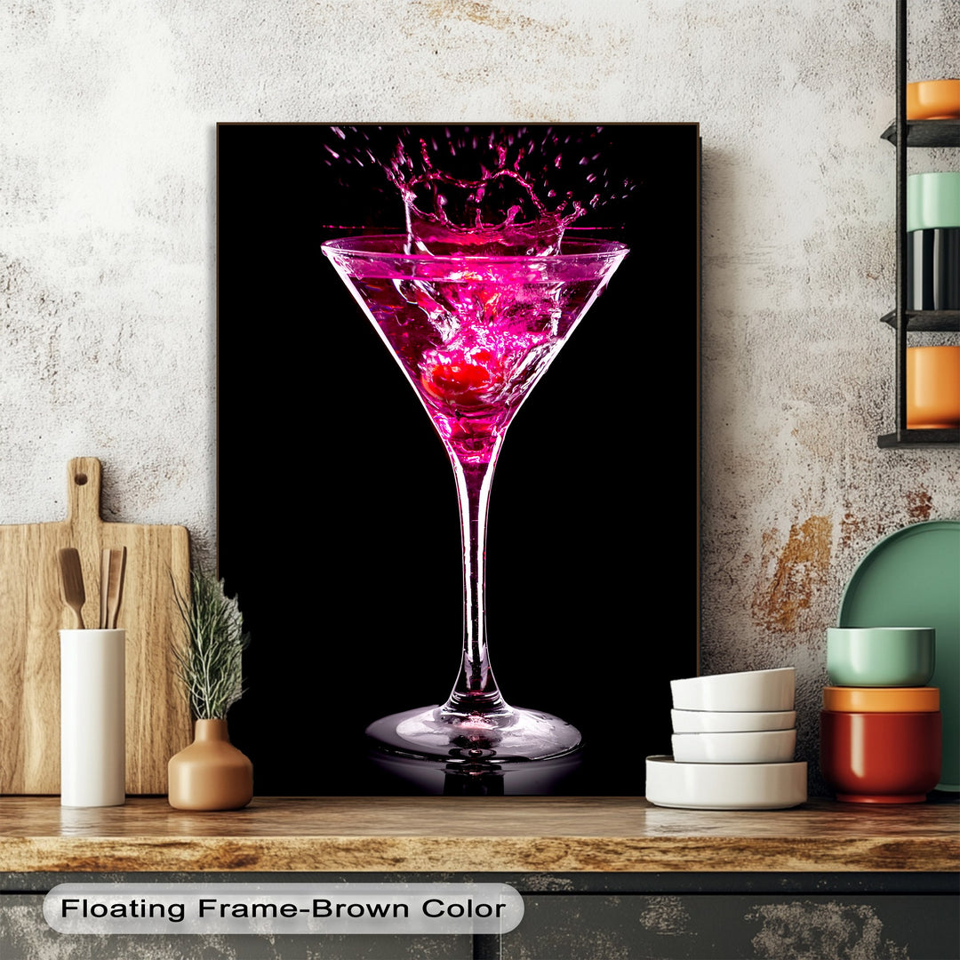 The vibrant color transition from dark background to brilliant fuchsia in this best canvas prints features a dynamic, splashing pink martini cocktail.