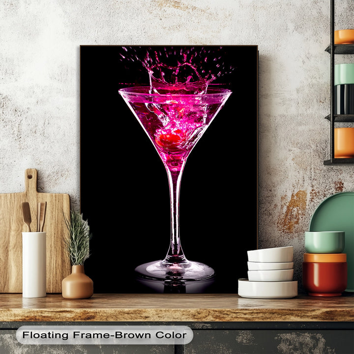 The vibrant color transition from dark background to brilliant fuchsia in this best canvas prints features a dynamic, splashing pink martini cocktail.