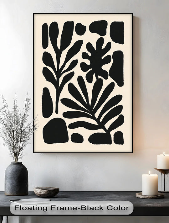 Bold botanical silhouettes cast strong light and shadow in this minimalist black and beige canvas wall decor print.