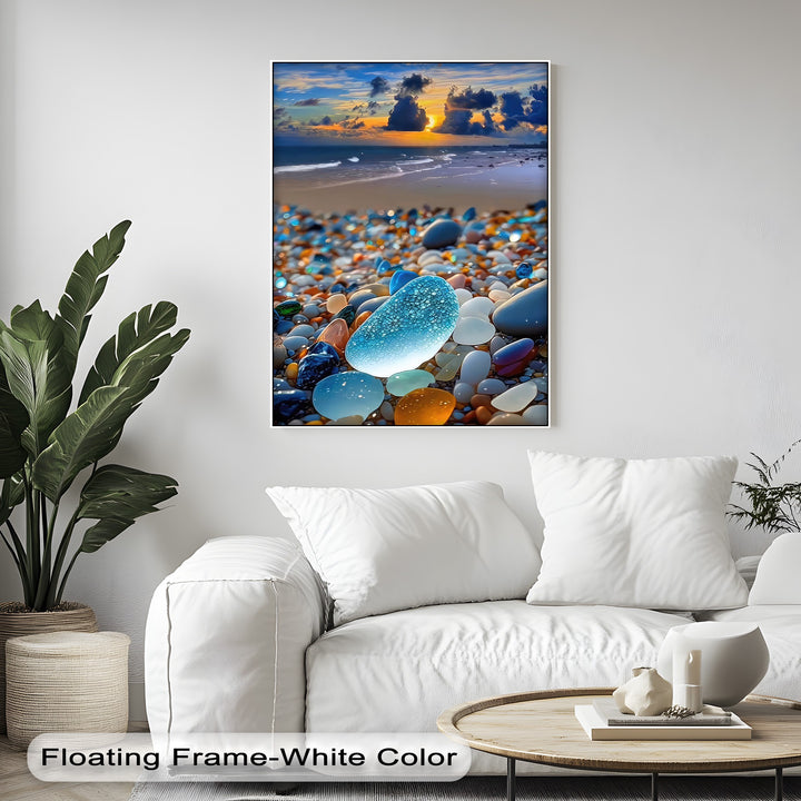 The stillness of a vivid sunset over shimmering sea glass and colorful pebbles on a tranquil beach in this canvas painting.