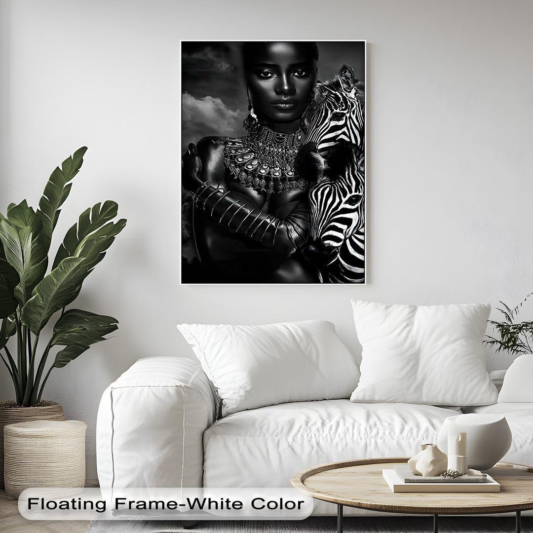 The visual rhythm of this elegant monochrome canvas wall art pulsates with the striking contrasts of the woman's jewelry and the zebra's bold stripes.