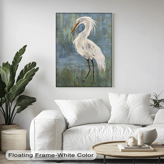 Showing the realistic detail of the feathers and long beak, this hanging canvas features a graceful white heron set against a minimalist blue-green marsh.