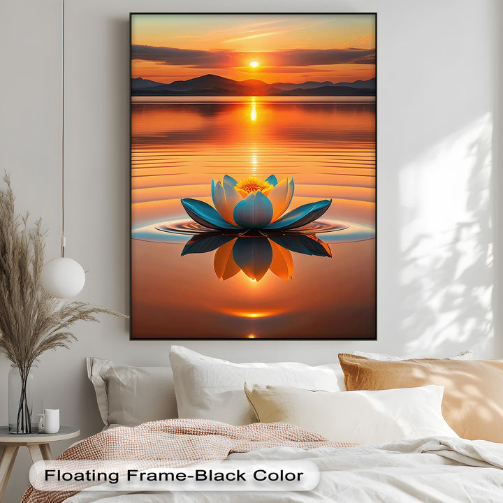 A vibrant teal and orange lotus flower floats on calm water, its clear reflection visible, making beautiful high quality canvas prints.