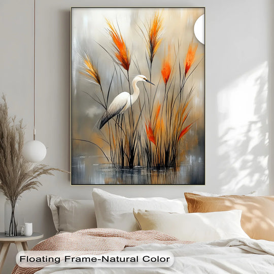 Darkest reeds create striking contrast in this marshland scene depicted on canvas wall decor featuring a white heron and fiery crimson accents.