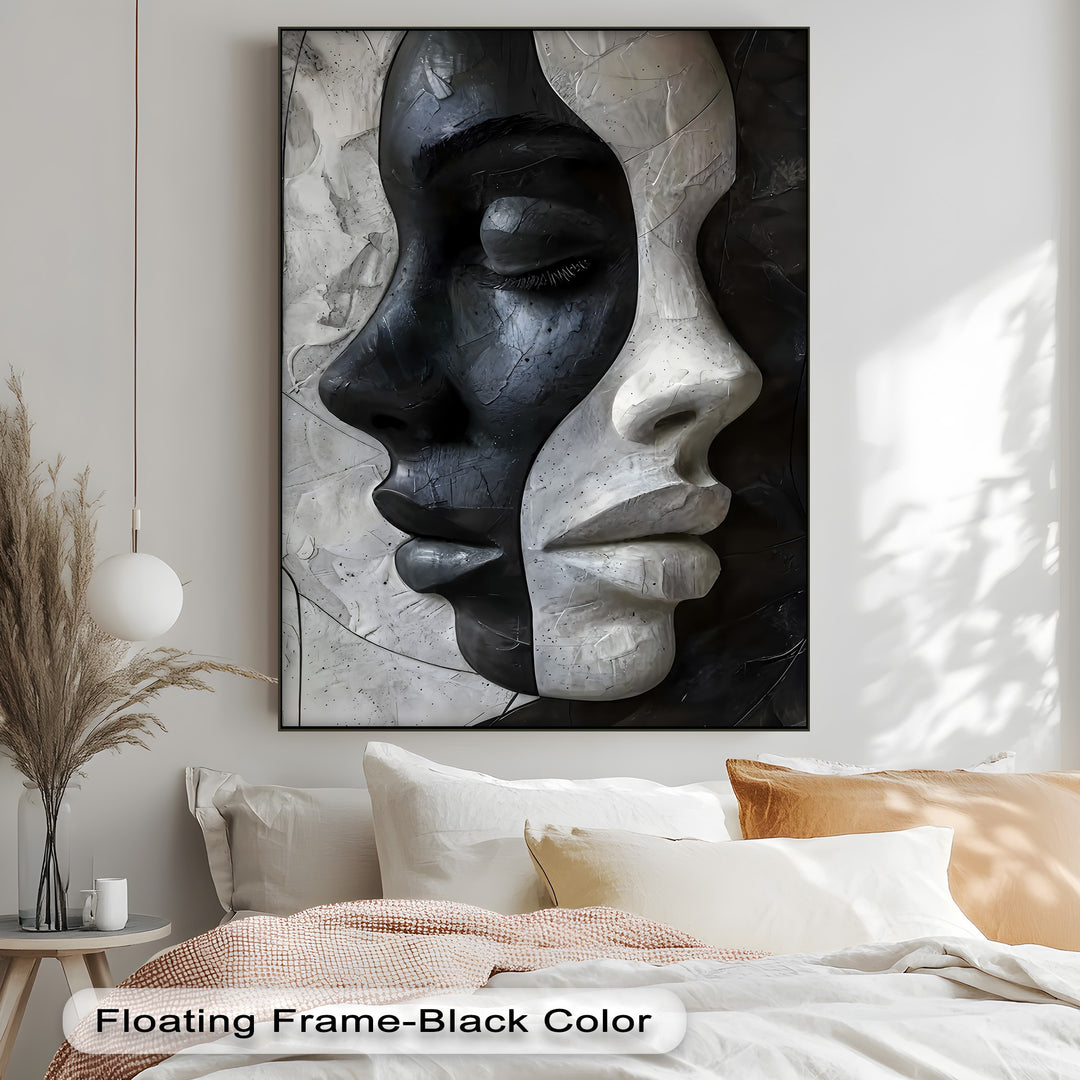 The striking transition between deep black and stark white faces creates captivating abstract canvas wall decor.
