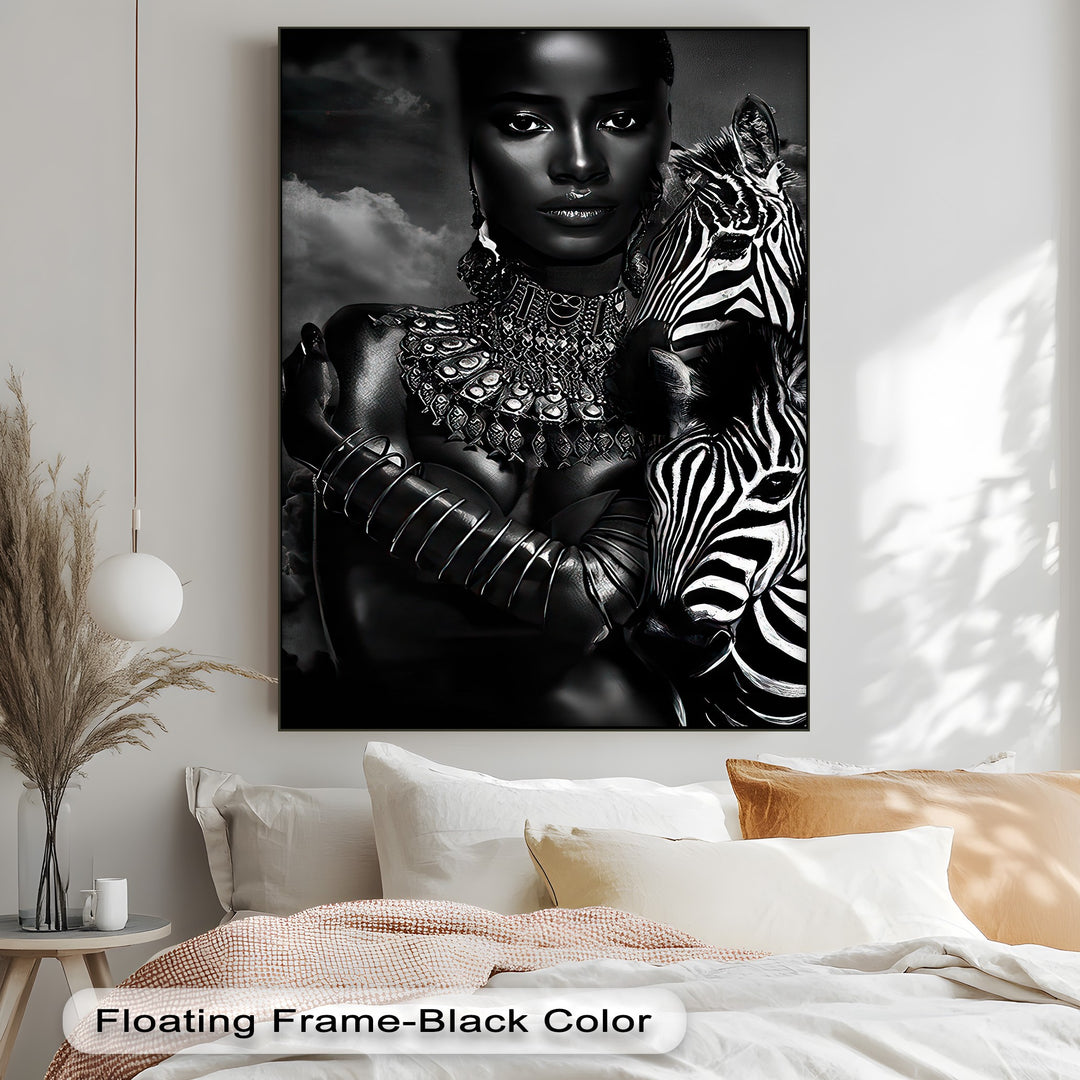 The dramatic interplay of light and shadow defines this monochrome zebra canvas wall art, portraying an elegant woman with a striking zebra.