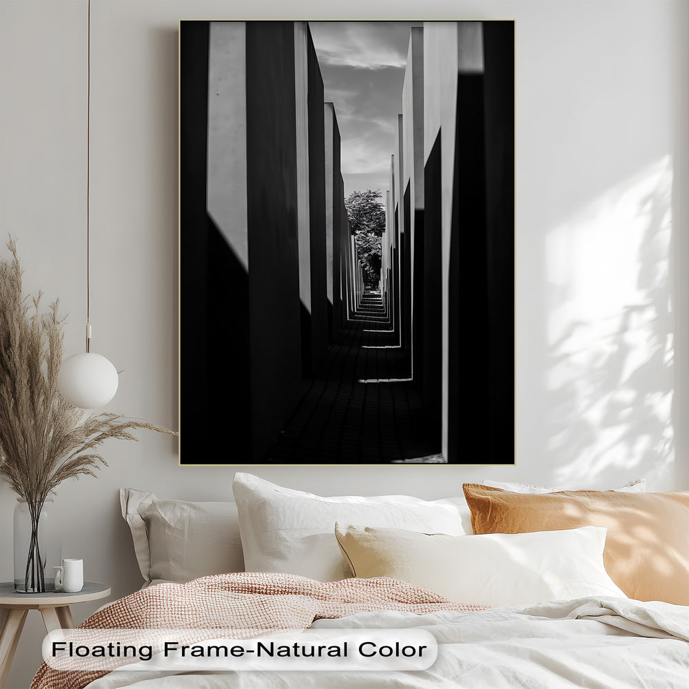 This striking canvas print leads the eye through stark architectural lines toward nature's calm.

