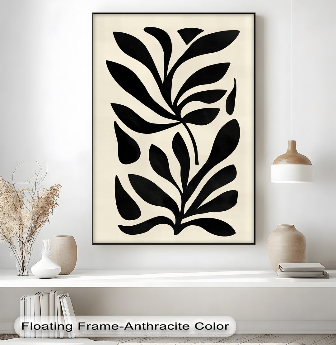 Highlighting the clean lines of its black edge, this framed minimalist botanical hanging canvas art print features a border that enhances the modern abstract leaf design.