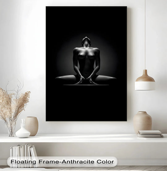 Negative space accentuates the sculpted shadow and sensual lines of this black and white female form canvas art, a stunning example of minimalist canvas art.
