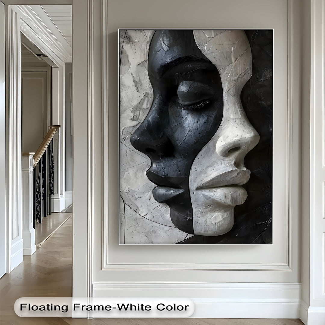 The organic forms of contrasting black and white faces create a striking abstract modern canvas artwork, perfect for wall art.