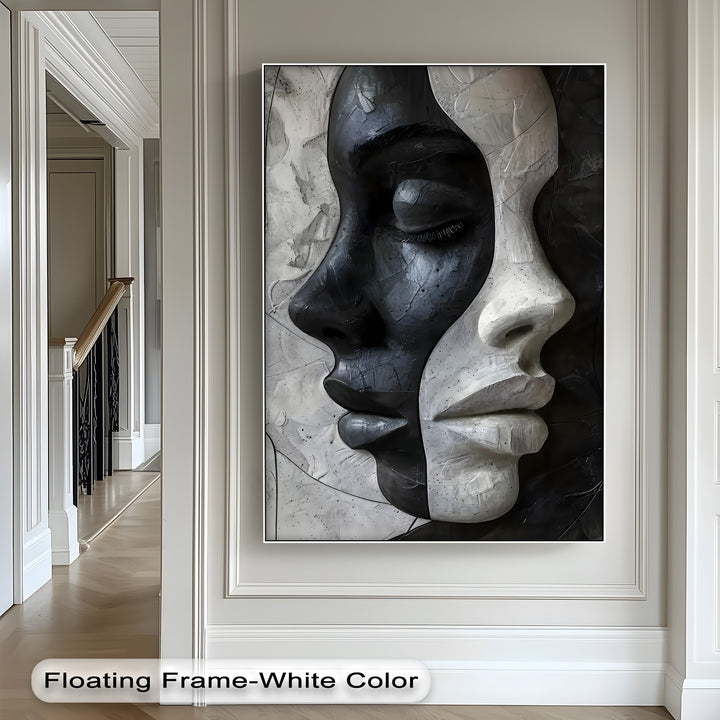 The organic forms of contrasting black and white faces create a striking abstract modern canvas artwork, perfect for wall art.