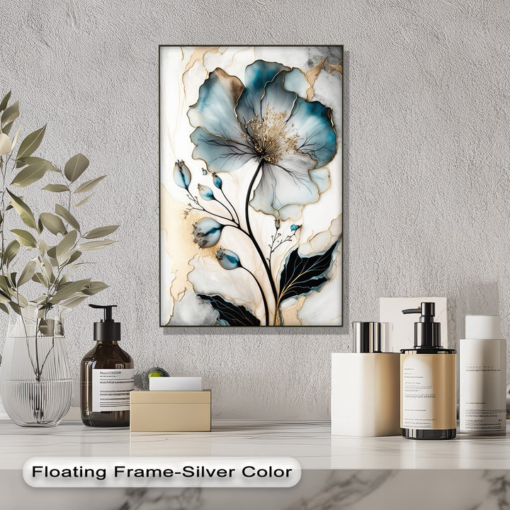 The brightest area of this blue floral canvas wall art showcases luminous white and shimmering gold abstract patterns and delicate light blue petals.