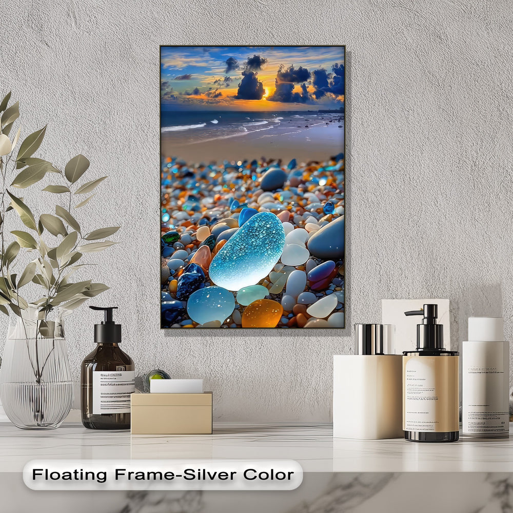 Glowing blue sea glass shines among vibrant beach pebbles, ocean waves, and a coastal sunset on this beautiful canvas art.