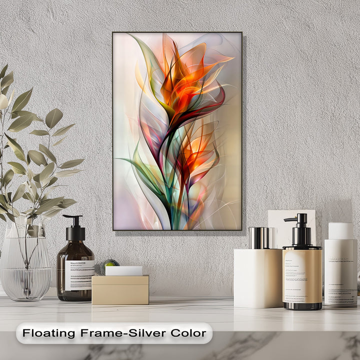 Swirling abstract botanical shapes in orange, red, and green create a dynamic sense of movement on this modern framed canvas.