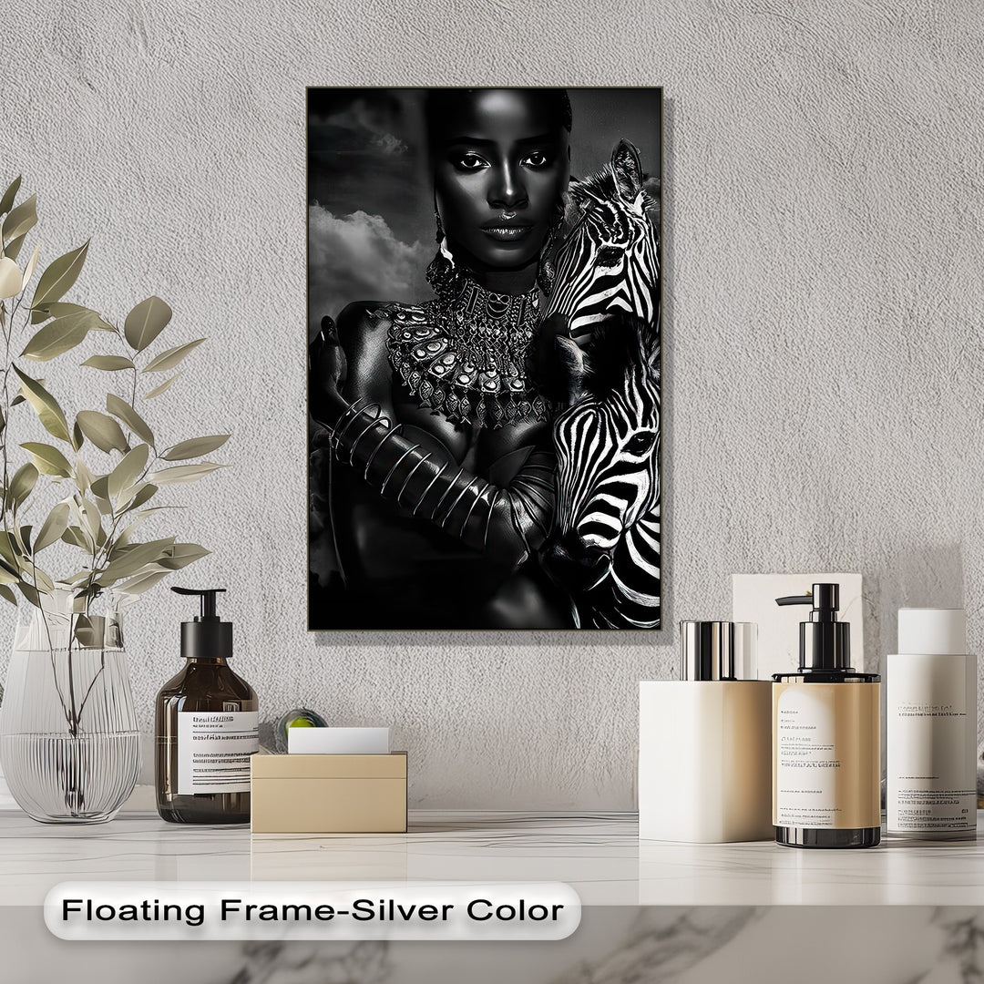 The subtly textured white wall behind the elegant monochrome zebra canvas wall art adds depth to the safari portrait.