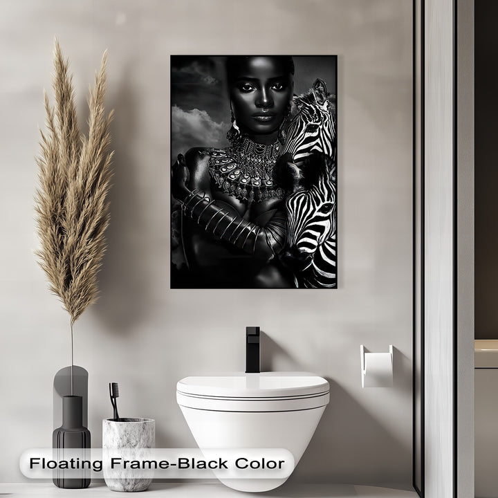 Showcasing compelling depth and artistic layers, this elegant monochrome canvas art features a powerful woman embracing a zebra, creating rich visual planes.