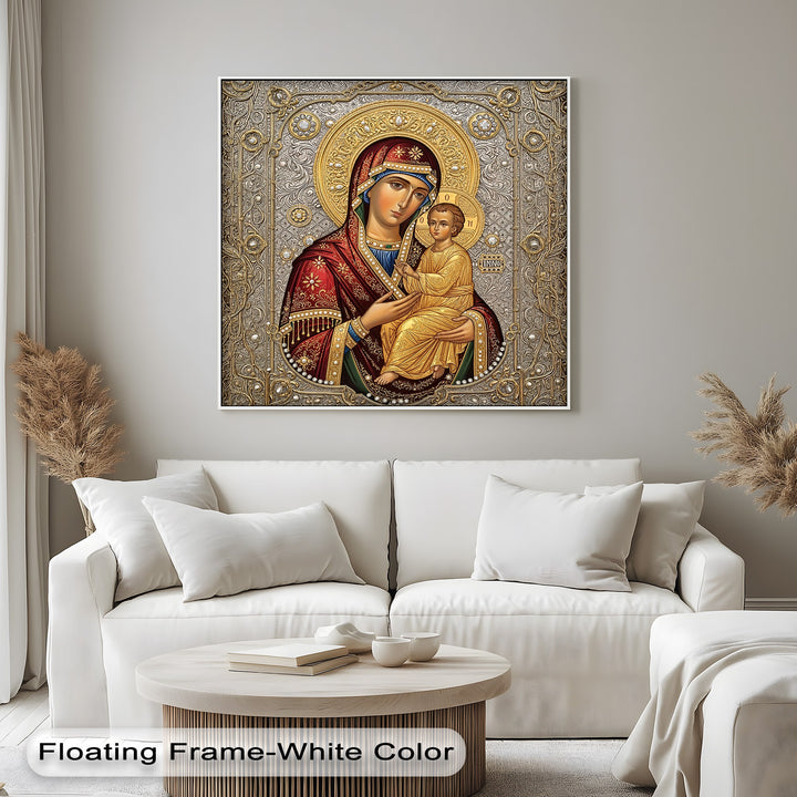 The deeply textured surface of the ornate gold and silver details enhances this religious Virgin Mary and Child framed canvas.
