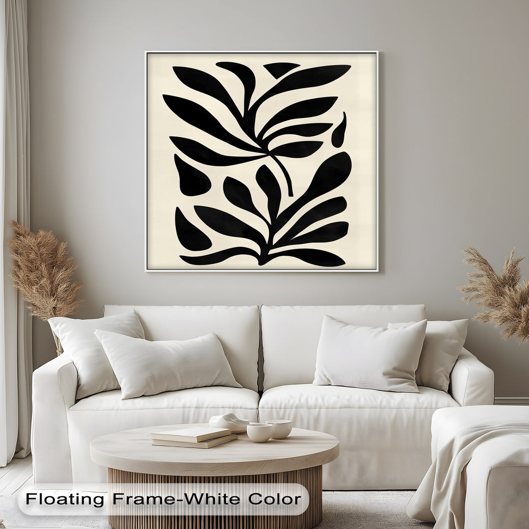 The layering effect is seen in this minimalist black botanical canvas print, adding depth to its modern abstract leaf design and enhancing the appeal of the canvas wall decor.