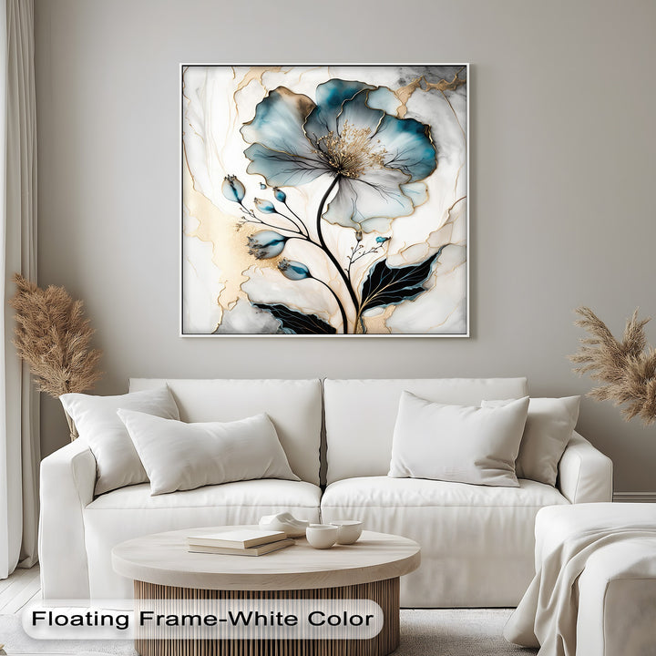 The plush white sofa's soft cushions and pillows provide a comforting foreground to a sophisticated blue floral big canvas print.