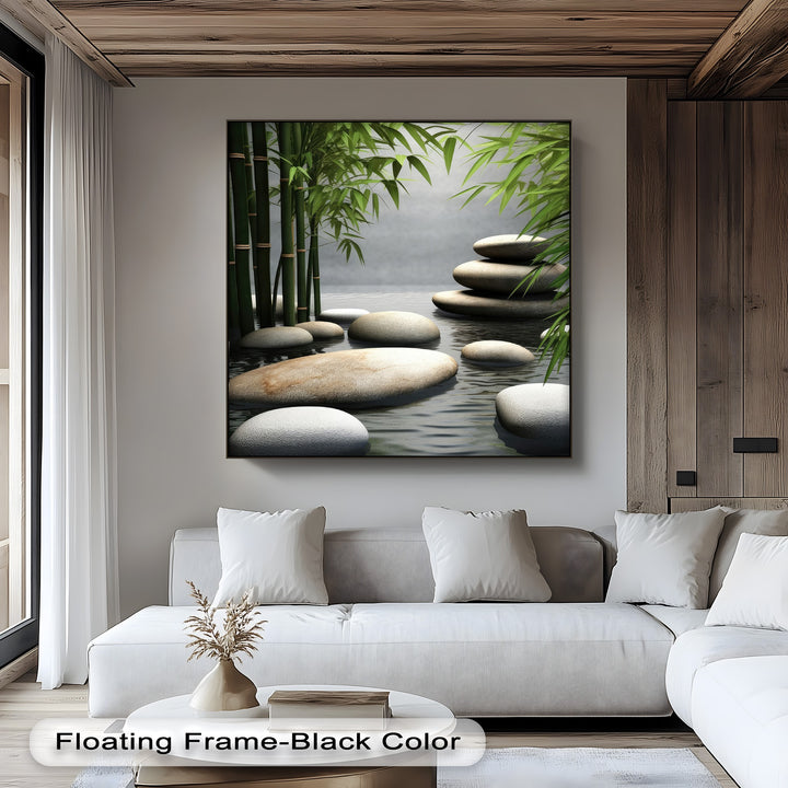 The striking color contrast in this canvas wall decor highlights vibrant green bamboo and tranquil zen stones in a serene spa-like setting.