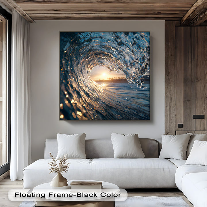 The deep black frame of the ocean wave canvas painting sharply contrasts with the bright sunset seascape, accentuating the golden light on the waves.