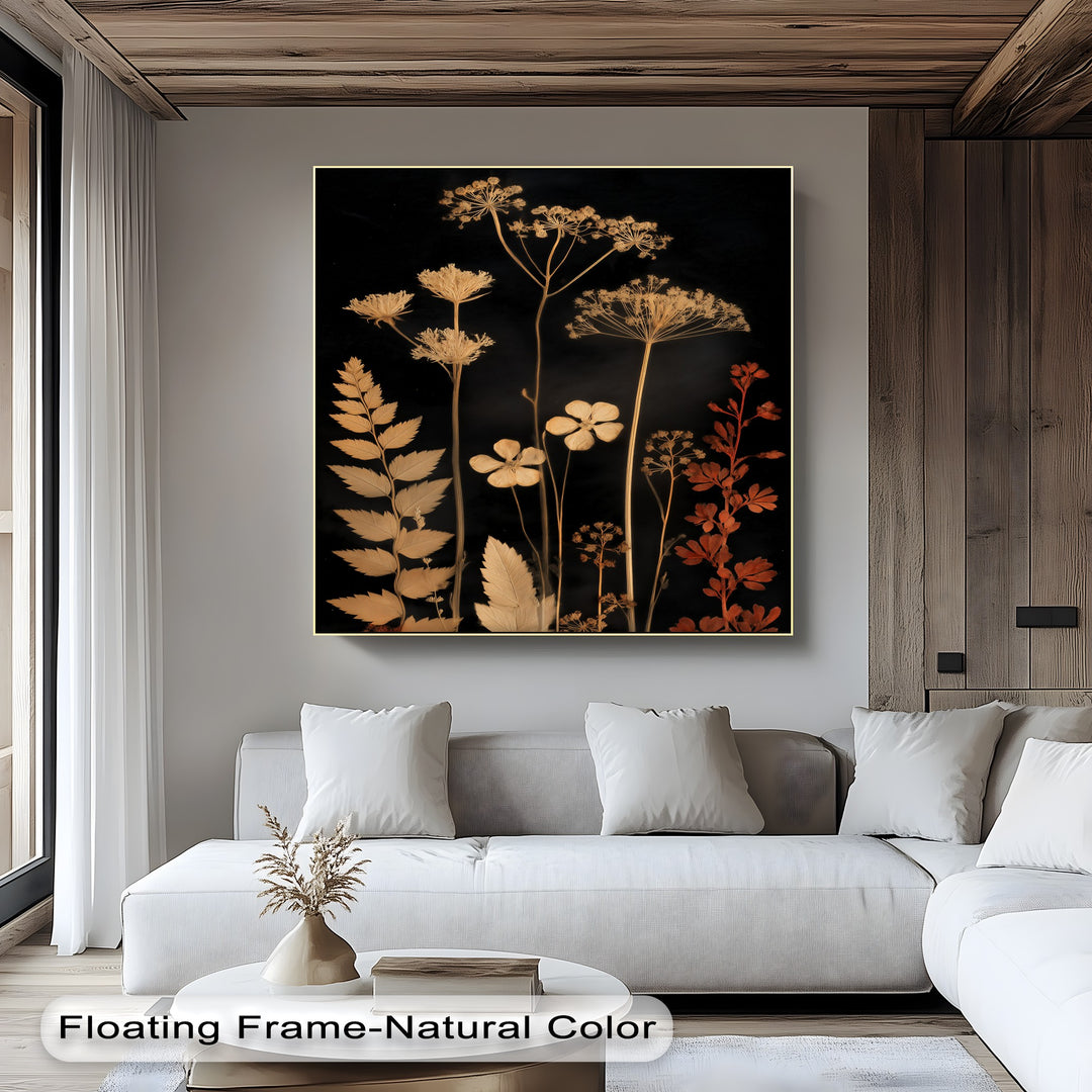The subtle, clean finish of the elegant botanical silhouette canvas artwork highlights the golden floral stems against a dark background.