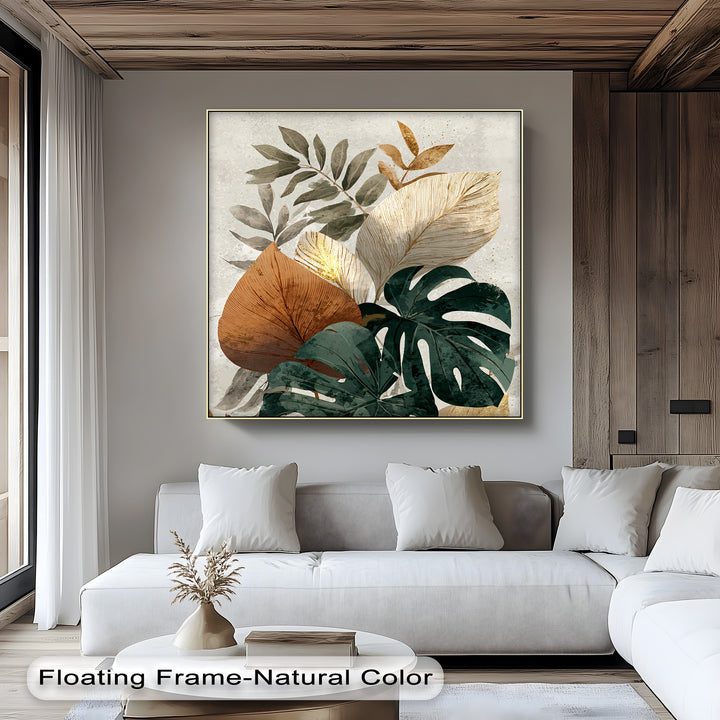 Displaying organic forms, this neutral botanical monstera canvas print features a collection of big canvas prints shaped like tropical leaves and plants.