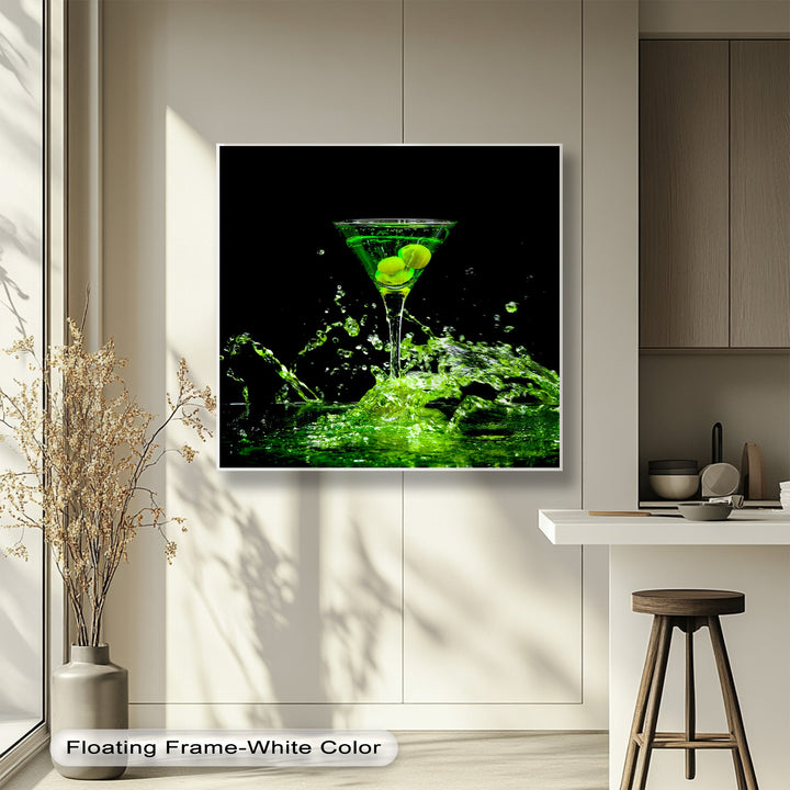 The crisp white borders of this premium canvas decor beautifully frame a vivid green martini canvas print featuring a neon cocktail splash.