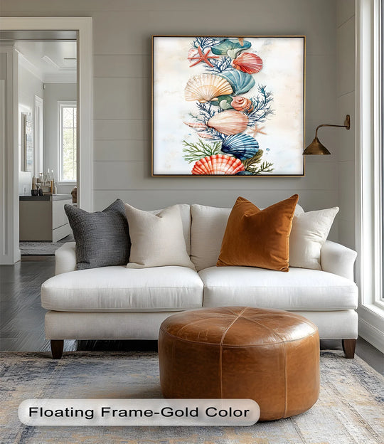 Foreground details reveal the colorful Tide Bloom canvas pictures, a vertical shell and coral print adding coastal charm to this inviting living space.
