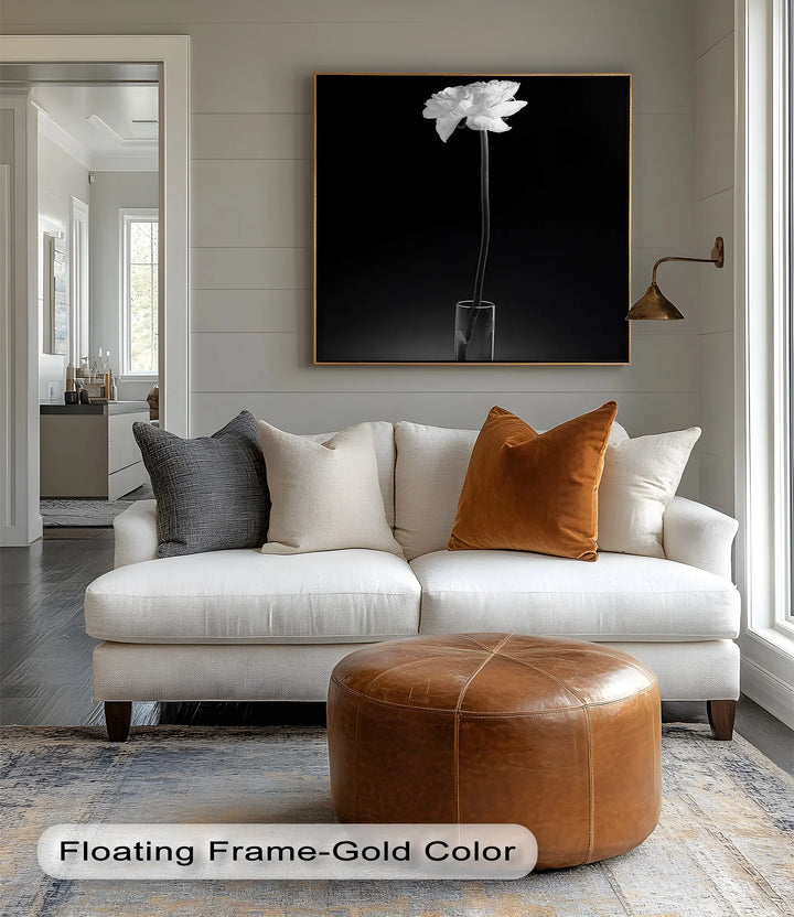 Elevate modern interiors with this striking canvas painting of a flower in a glass vase on a deep black background.

