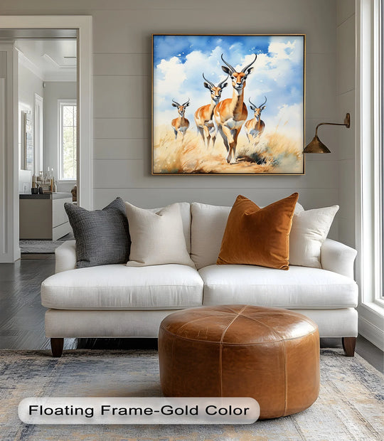 Featuring a refined gold finish, this desert grace antelope herd in motion animal framed canvas art print elevates any living space.
