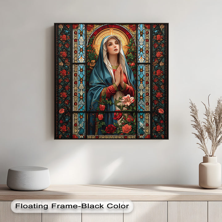 A pristine white wall forms the backdrop for a beautiful Stained Glass Mary canvas art print, resting above a light oak console table.