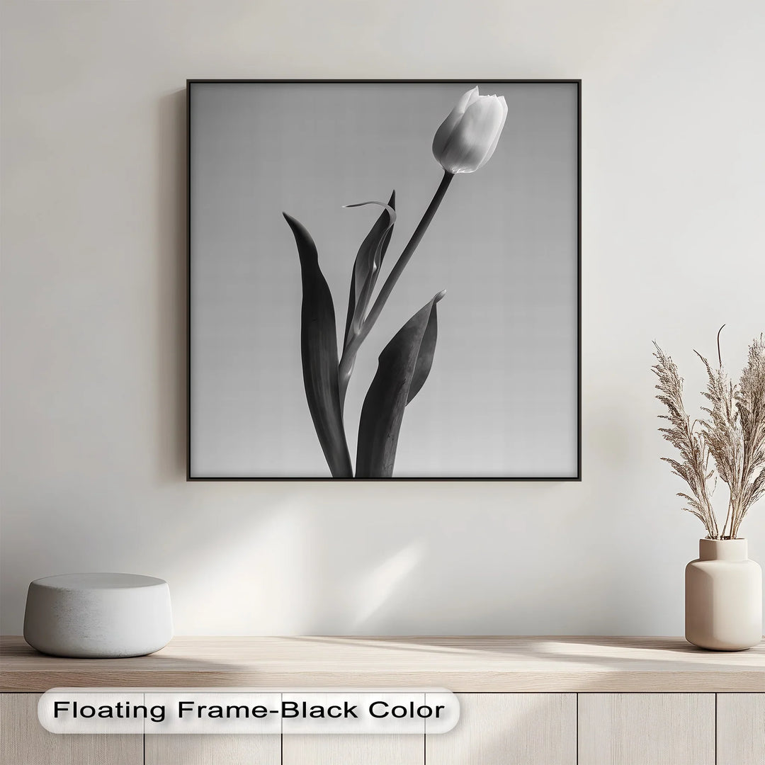 Add botanical charm to any space with this slender, sophisticated canvas painting of a tulip.

