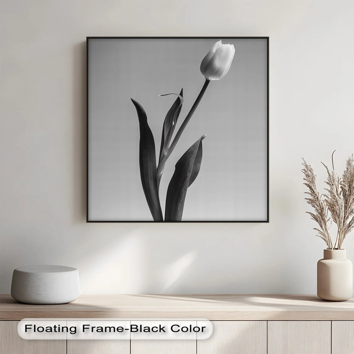 Add botanical charm to any space with this slender, sophisticated canvas painting of a tulip.


