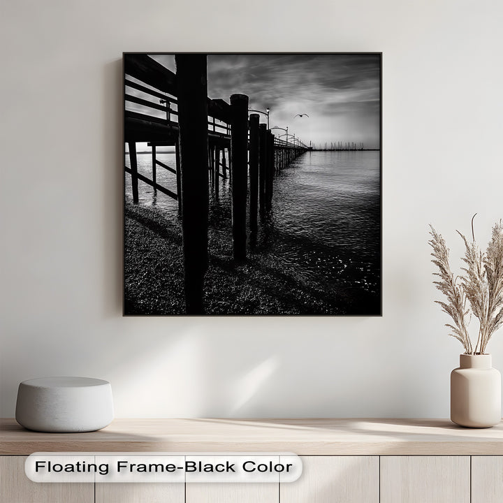Silhouettes and sea reflections create drama in this fine-art photo canvas.

