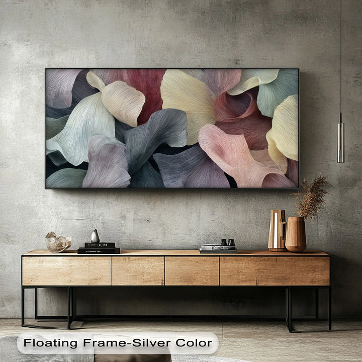 Modern wall art featuring petal inspired shapes in muted and elegant tones

