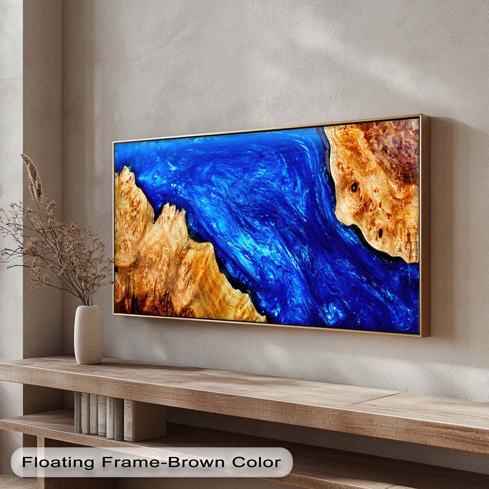 A horizontal rectangular premium canvas decor piece features vibrant blue resin flowing through natural wood grain in an abstract ocean design.