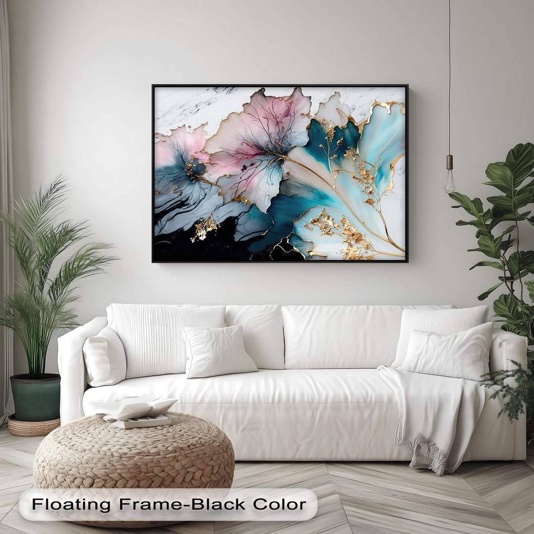 A textured woven pouf with books and a plush white sofa anchor the scene, complementing the elegant pastel floral canvas art prints.