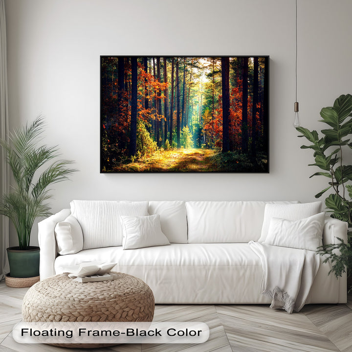 The serene background features a clean white wall, green plants, and a stylish pendant light, showcasing the Autumn Forest best canvas prints.