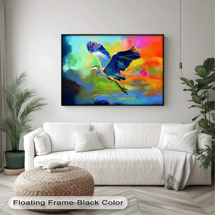 Flight of Radiance – Blue Heron in Vibrant Skies Canvas Print - MyPhotoStation